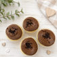 Vanilla cupcakes with fudge frosting